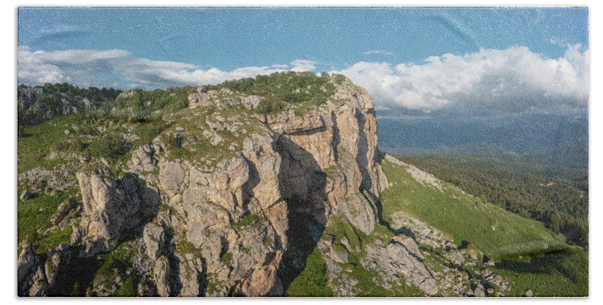 Mountain Bath Towel featuring the photograph Cliff plateau in Caucasus Mountains by Mikhail Kokhanchikov