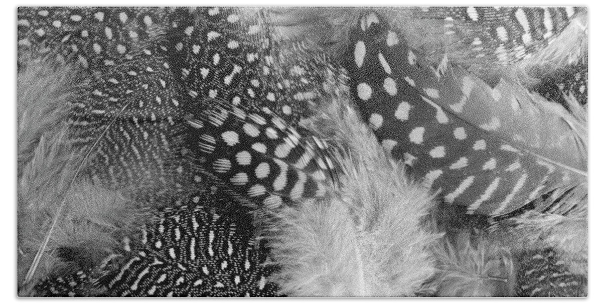 Feathers Bath Towel featuring the photograph Closeup Of The Grey Feather Background by Severija Kirilovaite