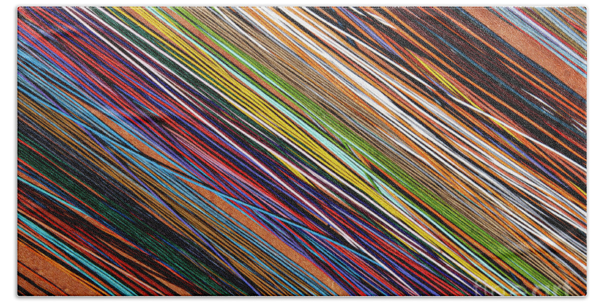 Apt Bath Towel featuring the photograph Colorful Leather Strips at Apt Market by Bob Phillips