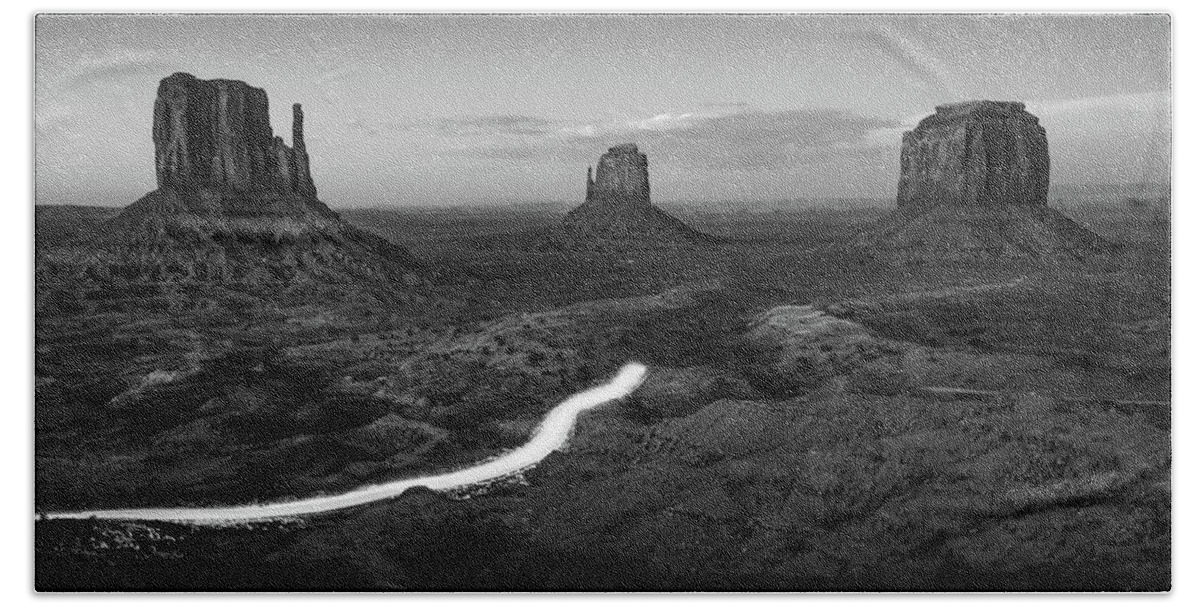 Monument Valley Hand Towel featuring the photograph Driving Through Monument Valley at Dusk in Monochrome by Gregory Ballos