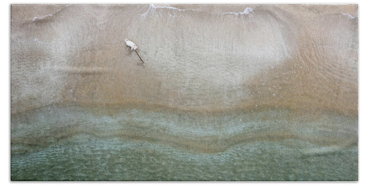 Animal Running Bath Towel featuring the photograph Drone aerial of white Dog running and playing at empty sandy beach by Michalakis Ppalis