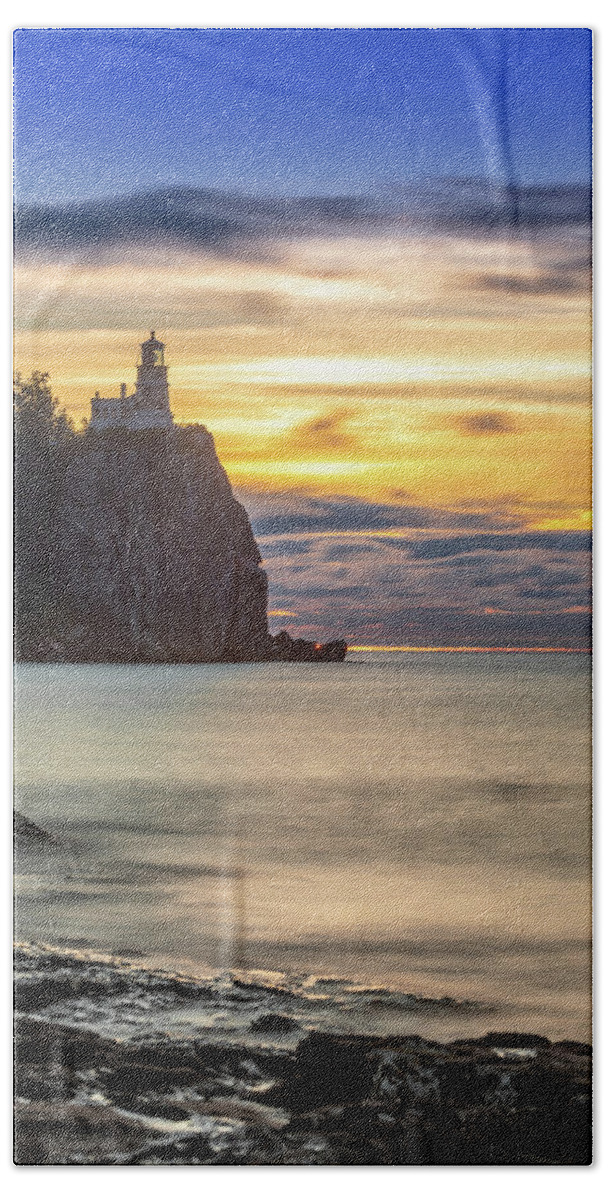 Split Rock Bath Towel featuring the photograph First Sun Rays at Split Rock Lighthouse by Sebastian Musial