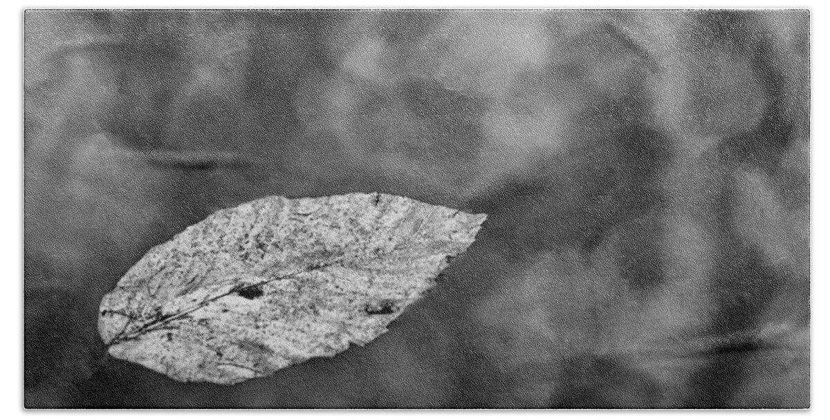Leaf Bath Towel featuring the photograph Floating Leaf in Black and White by Bob Decker