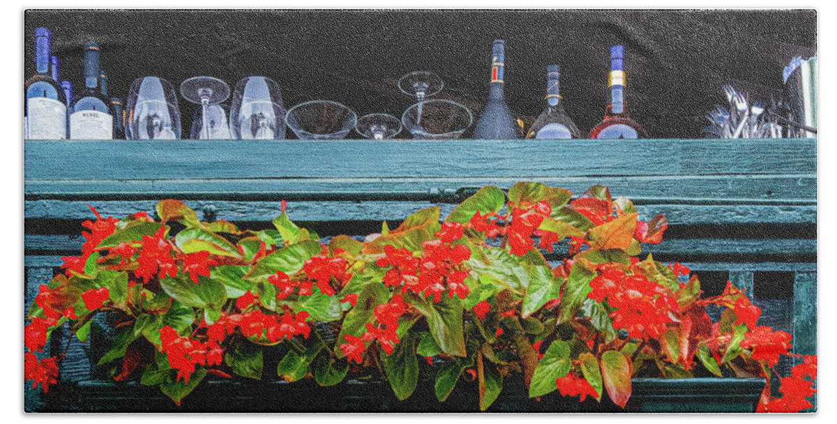 Tom Singleton Photography Bath Towel featuring the photograph Flowers And Bottles by Tom Singleton