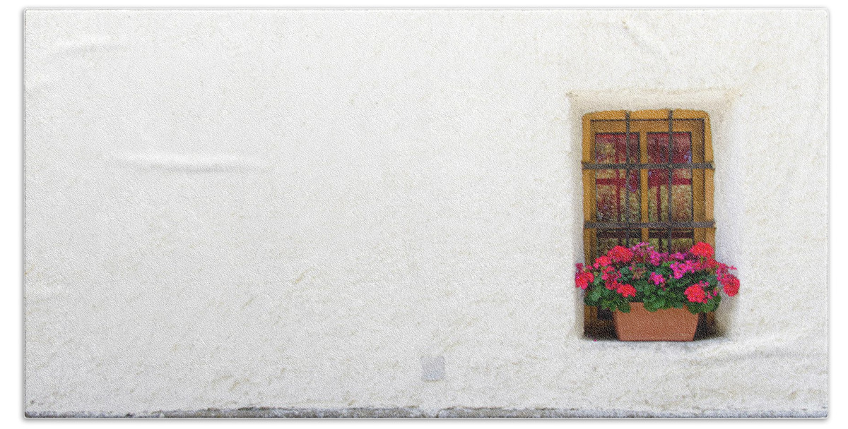 Colorful Flowers Sit In A Window In Slovenia. Bath Towel featuring the photograph Flowers outside a Window by Tito Slack