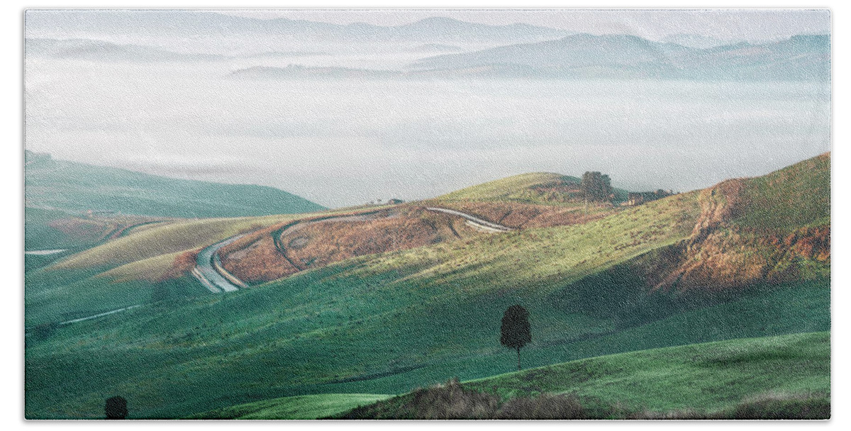 Tuscany Bath Towel featuring the photograph Foggy morning landscape in Volterra. Tuscany by Stefano Orazzini