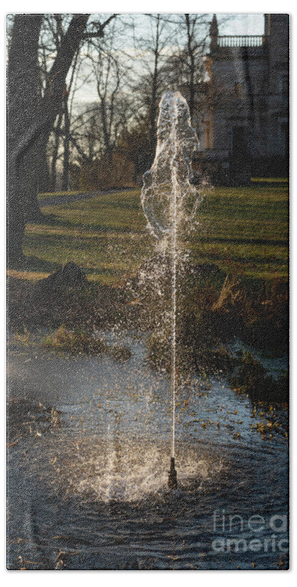 Fountain Bath Towel featuring the photograph Fountain and trees in the evening light 3 by Adriana Mueller