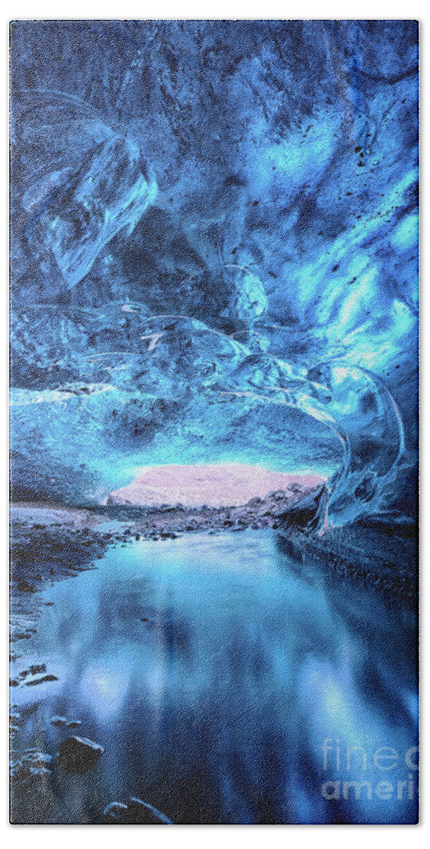 Iceland Bath Towel featuring the photograph Glacial river flows through a blue ice cave. Part of the Vatnajo by Jane Rix