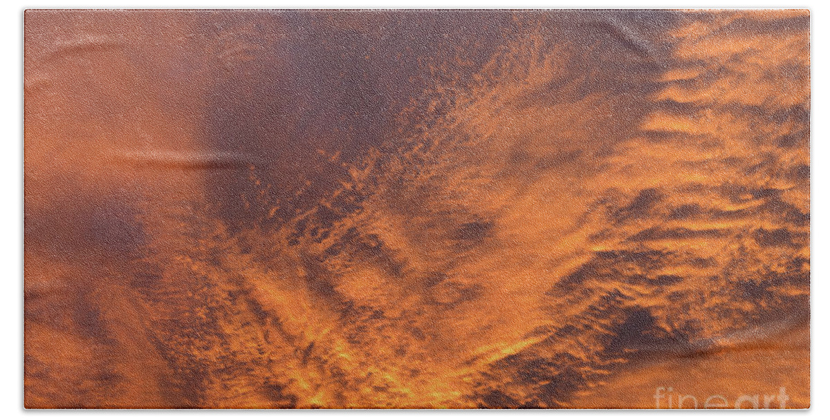 Clouds Bath Towel featuring the photograph Glowing sunset sky with deep orange clouds by Adriana Mueller
