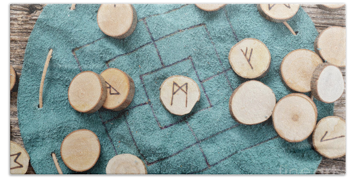 Runes Bath Towel featuring the photograph Handmade runes for fortunetelling by Anastasy Yarmolovich