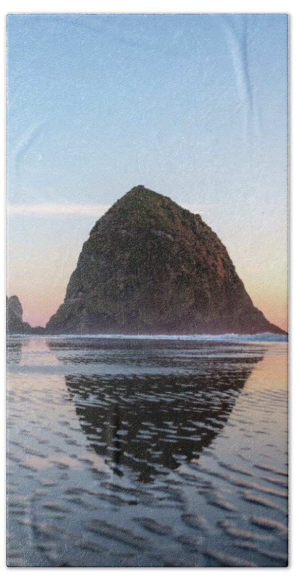 Haystack Rock Sunset Hand Towel featuring the photograph Haystack Rock Sunset At Cannon Beach by Doug Ash
