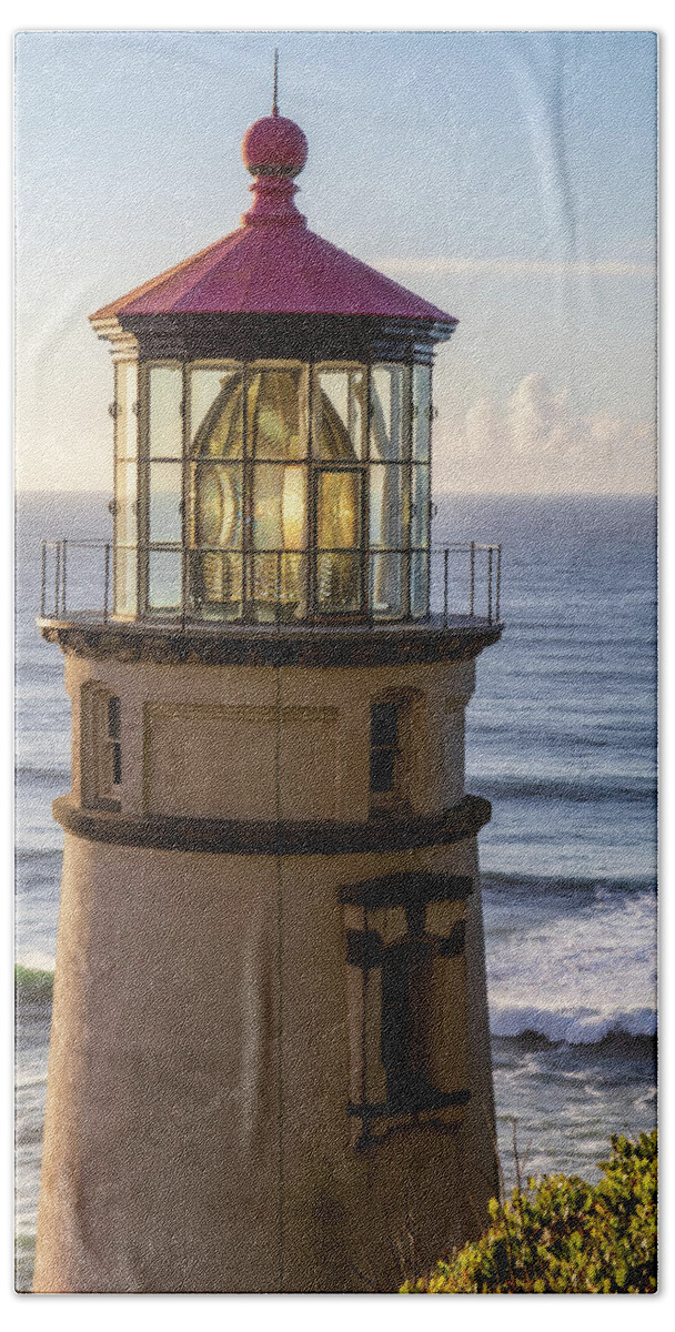 Heceta Head Lighthouse Hand Towel featuring the photograph Heceta Head Lighthouse in the Evening Light by Catherine Avilez