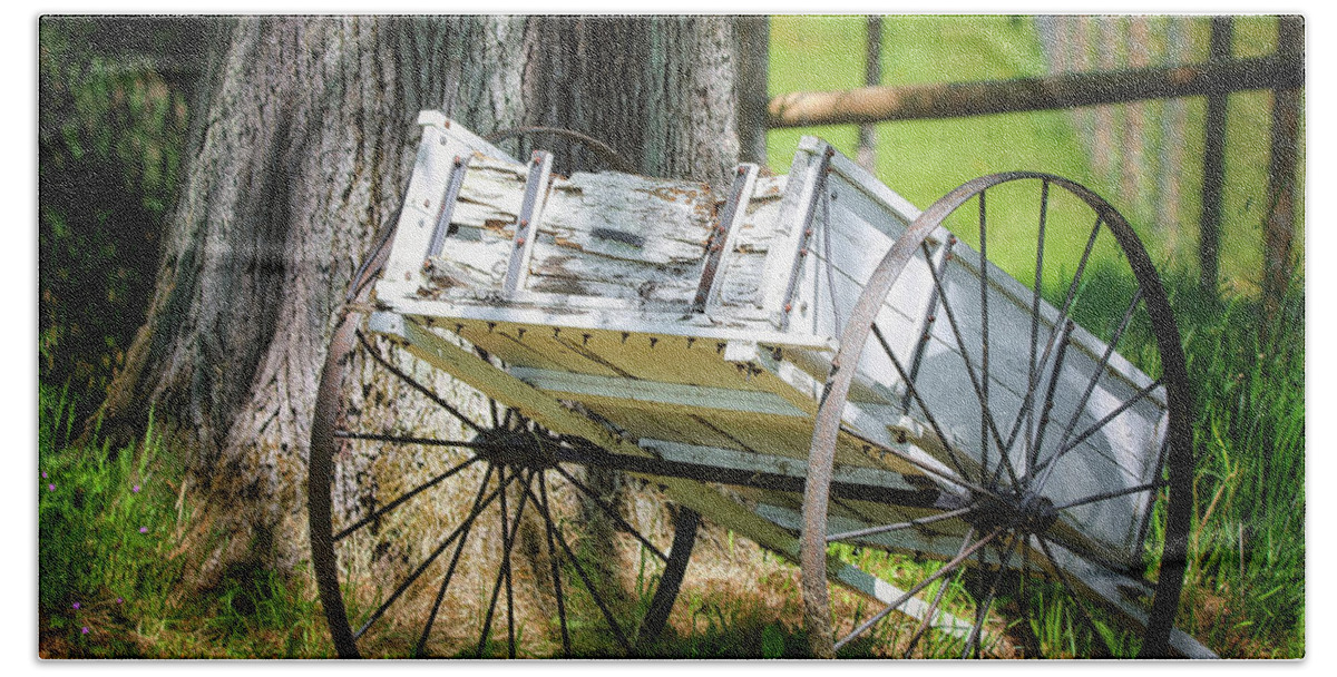 Landscape Bath Towel featuring the photograph Iron Wheels by Scott Burd