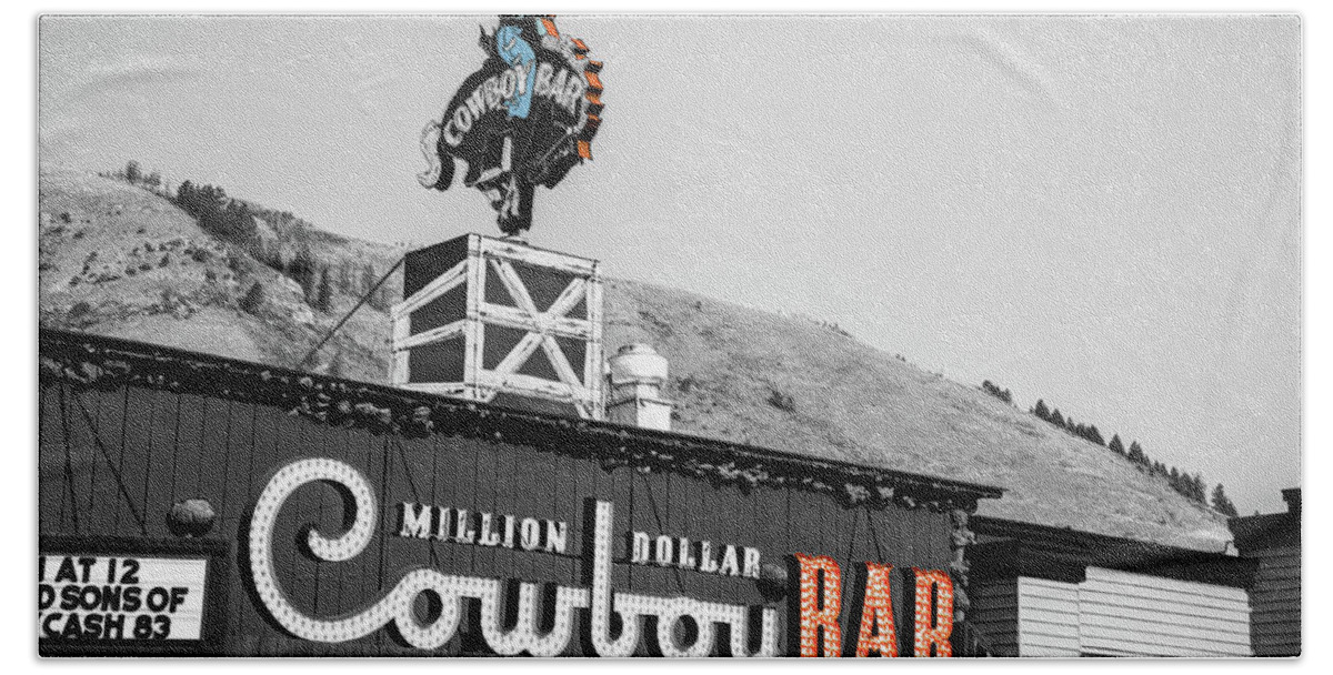 Jackson Hole Hand Towel featuring the photograph Jackson Square's Iconic Cowboy Bar - Selective Color Edition by Gregory Ballos