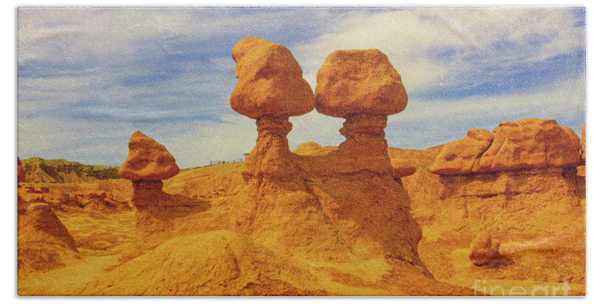 Goblin Valley Bath Towel featuring the photograph Kissing road stools goblin valley by Jeff Swan