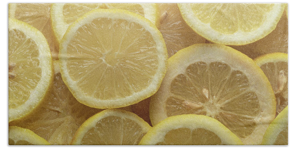 Lemon Hand Towel featuring the photograph Lemon Slices Panorama by Steve Gadomski