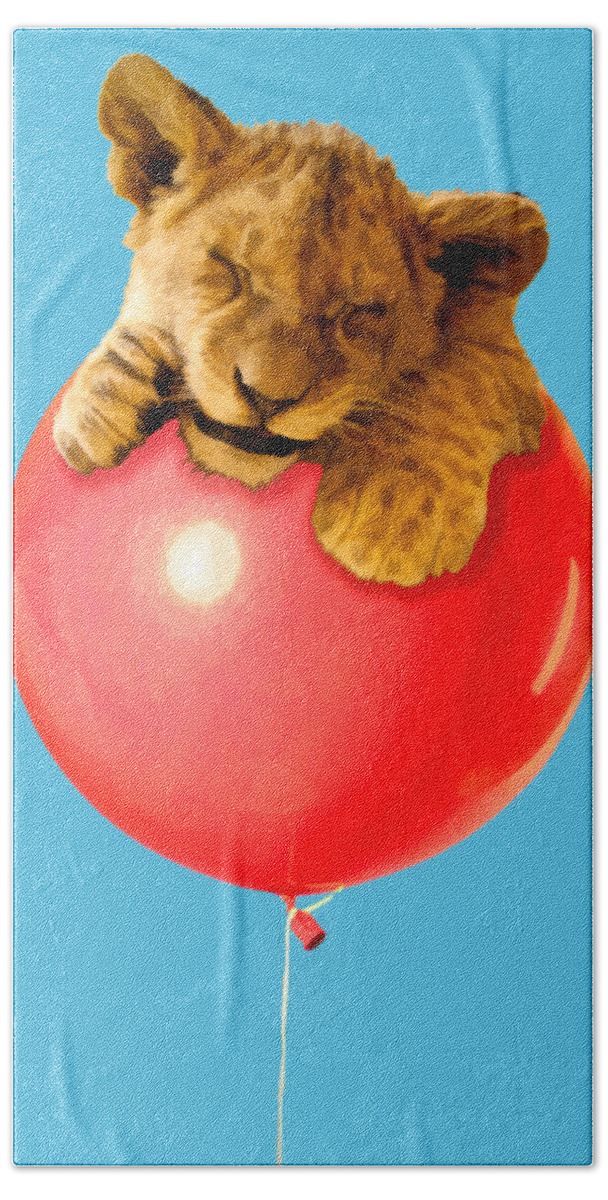 Balloon Bath Towel featuring the photograph Lion Cub on a Red Balloon by John Haldane