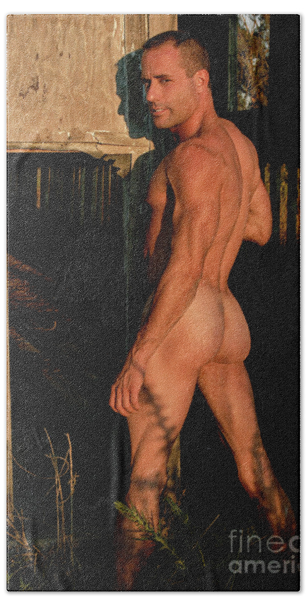 Homoerotic Bath Towel featuring the photograph Male Nude's Rear End in the setting Sun by Gunther Allen
