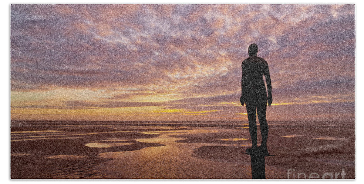 Another Place Hand Towel featuring the photograph Metal statues on Crosby beach, Merseyside, England by Neale And Judith Clark