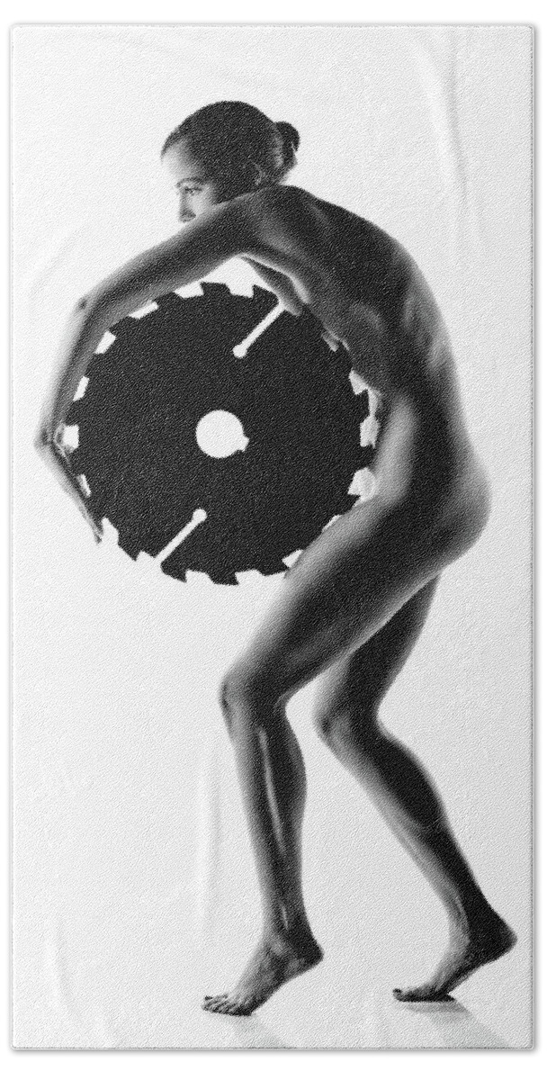 Woman Bath Towel featuring the photograph Nude woman with saw blade 1 by Johan Swanepoel