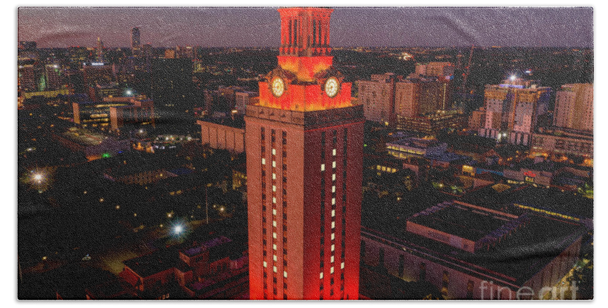 Ut Tower Bath Towel featuring the photograph Orange UT Tower lit with #1 to celebrate a national championship by Dan Herron
