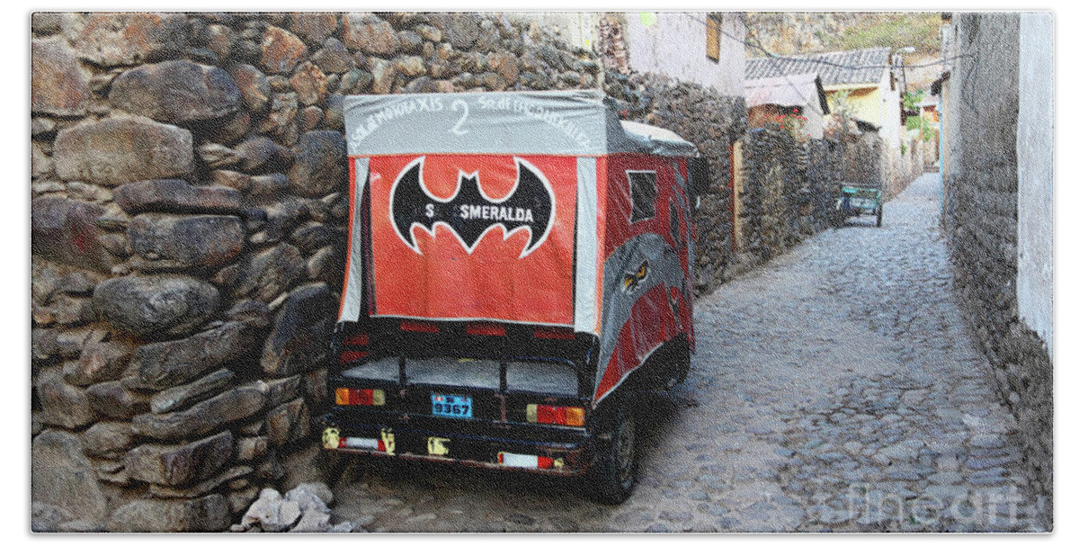 Transport Hand Towel featuring the photograph Peruvian Batmobile in Inca street in Ollantaytambo by James Brunker