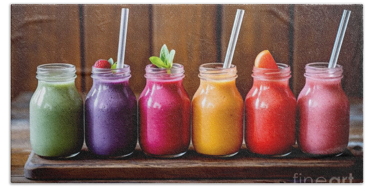 Smoothie Hand Towel featuring the painting premium Selection of colourful smoothies on rustic wood background by N Akkash