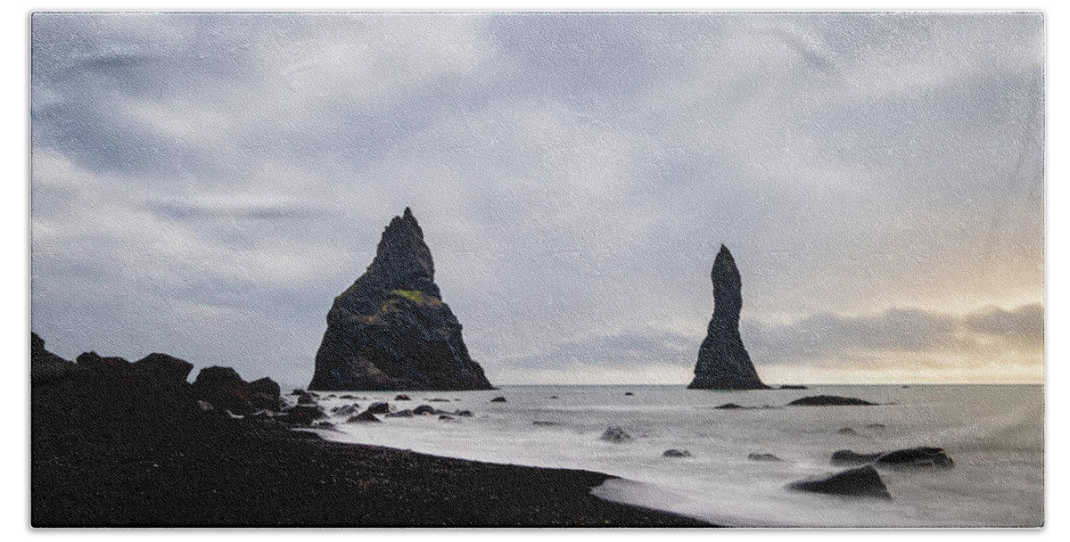 Reynisfjara Bath Towel featuring the photograph Reynisfjara black sand beach and Reynisdrangar in Iceland by Alexios Ntounas