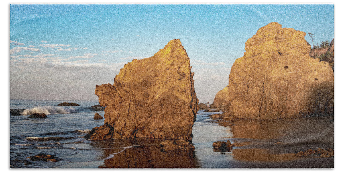 El Matador Hand Towel featuring the photograph Rock Reflection at El Matador State Beach by Matthew DeGrushe