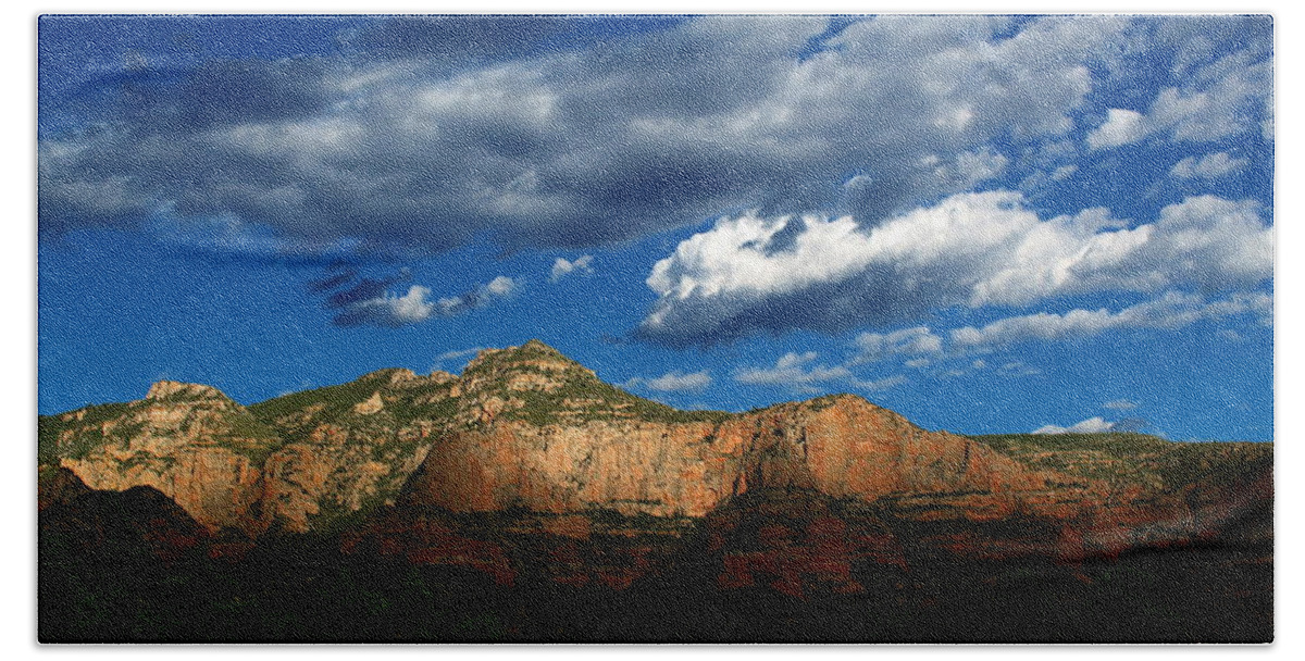 Sky Bath Towel featuring the photograph Rocks and Clouds by Jason Judd