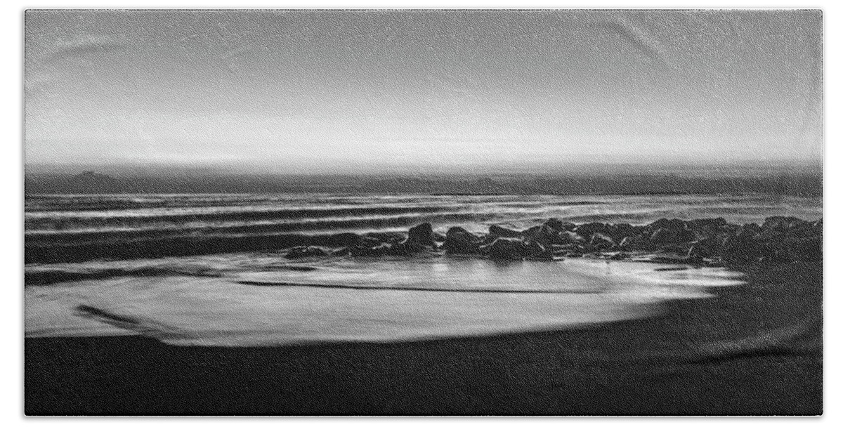 Birds Bath Towel featuring the photograph Rocky Beach at Dawn Black and White by Debra and Dave Vanderlaan