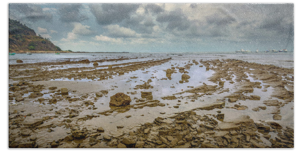 Shore Bath Towel featuring the photograph Rugged shoreline by Henri Leduc