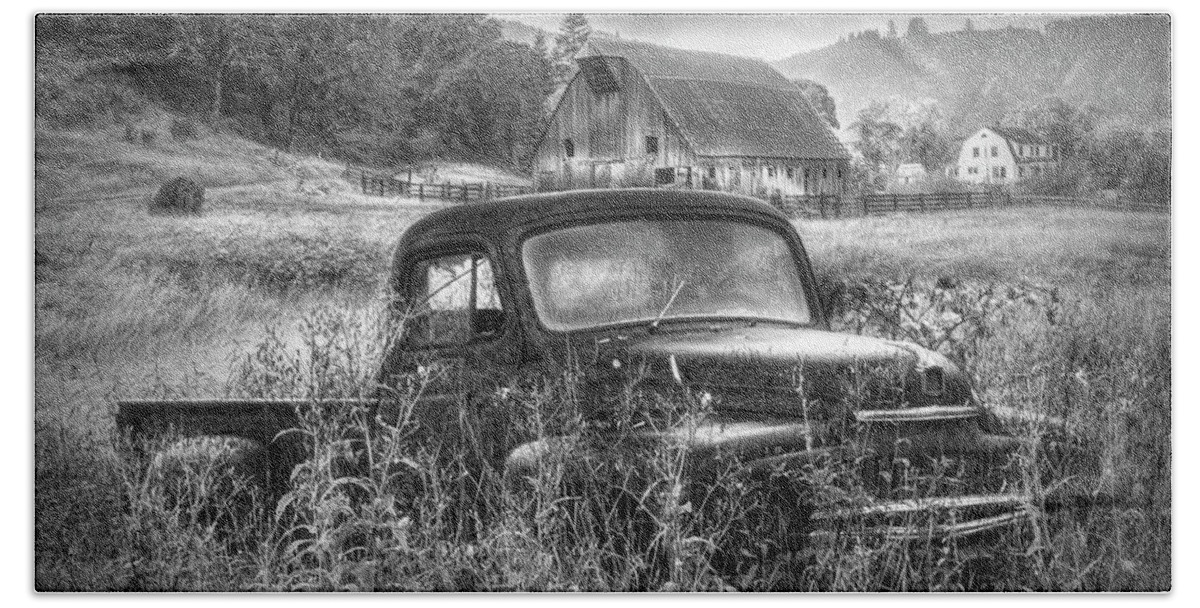 Barns Bath Towel featuring the photograph Rusty Truck Deep in the Wildflowers in Black and White by Debra and Dave Vanderlaan