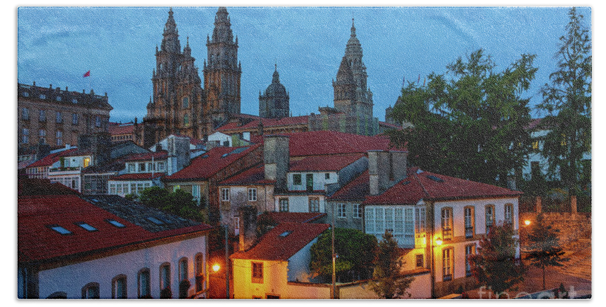 Way Bath Towel featuring the photograph Santiago de Compostela Cathedral Spectacular View by Night Dusk with Street Lights and Tiled Roofs La Corua Galicia by Pablo Avanzini