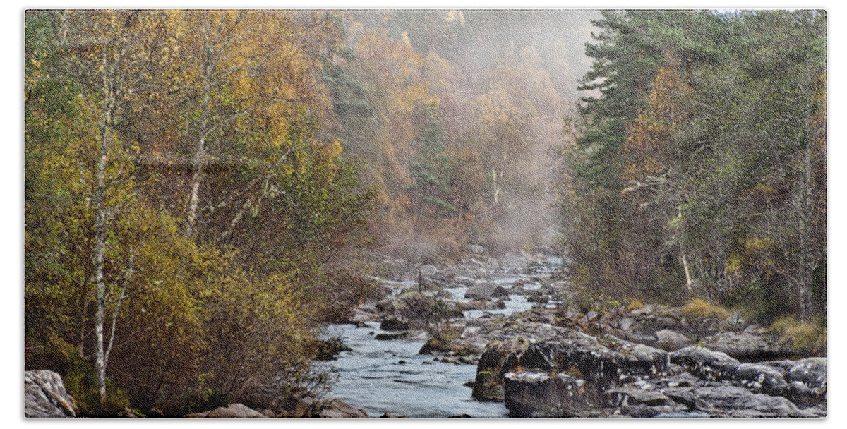 Fog Beauty Over River Scottish Golden Autumn Stones Boulders Cobbles Gravel Pebble Rocks Scree Birches Yellow Green Woods Forest Nature Elements Landscape View Scenery Water Flow Beautiful Delightful Pretty Calm Restful Relaxing Relaxation Serenity Atmospheric Aesthetic Mindfulness Magnificent Powerful Stunning Walking Art Artistic Painterly Imaginable Beauty Fresh Untouched Nobody Solitary Delicate Gentle Scotland River Scottish Highlands Uk Impression Expressive Misty Fall Vista Smart River Bath Towel featuring the photograph Fog Beauty Over River Scottish Golden Autumn by Tatiana Bogracheva