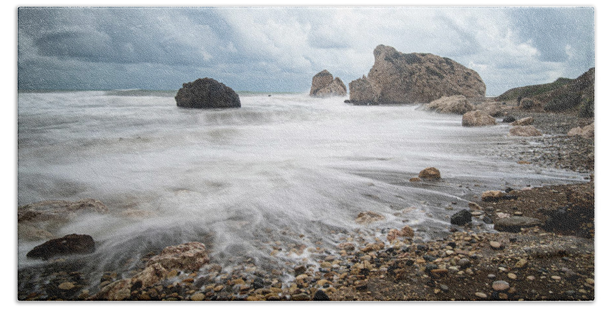 Sea Waves Bath Towel featuring the photograph Seascape with windy waves during stormy weather on a rocky coast by Michalakis Ppalis