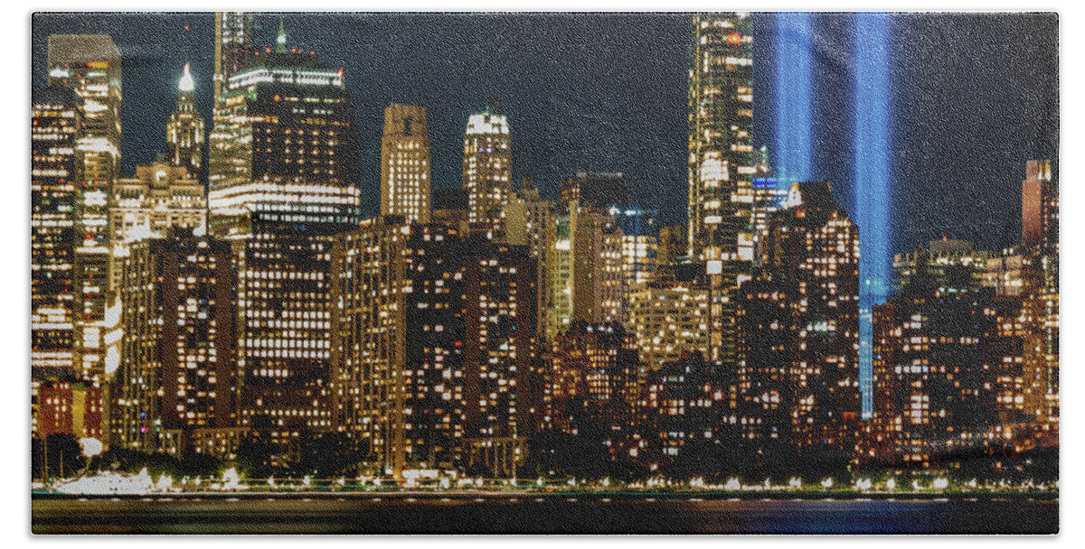 September 11 Tribute Lights Bath Towel featuring the photograph September 11 Tribute Lights and the Lower Manhattan Skyline by Alina Oswald