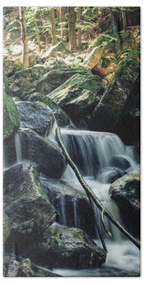 Jizera Mountains Bath Towel featuring the photograph Water flowing over rocks in icy morning weather by Vaclav Sonnek