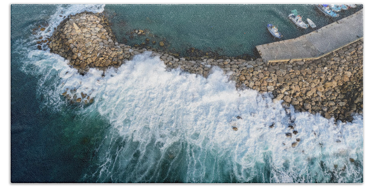 Brakewater Bath Towel featuring the photograph Stormy windy waves on the shore. Drone photography. by Michalakis Ppalis