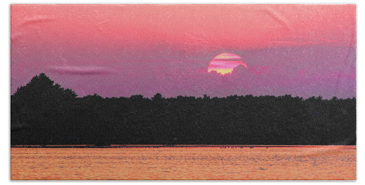 Sunset Bath Towel featuring the photograph Striped Setting Sun Over Water by Dale Kauzlaric
