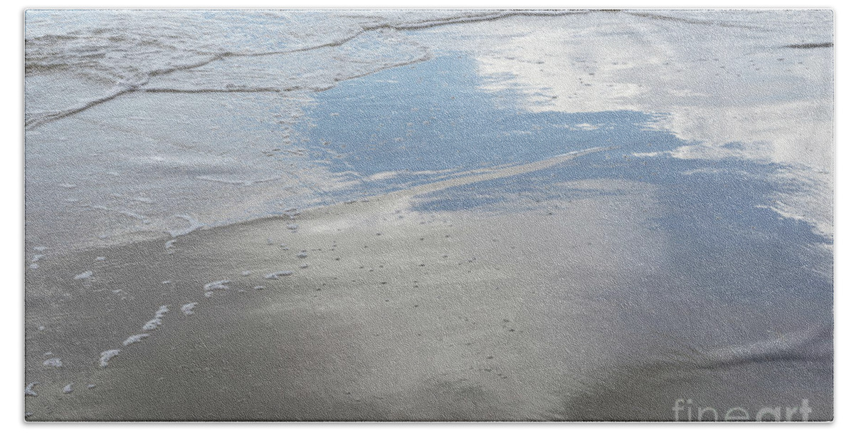 Sea Water Bath Towel featuring the photograph Subtle waves and reflection in the wet sand by Adriana Mueller
