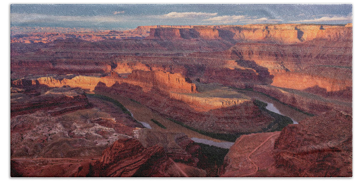 Canyonlands Hand Towel featuring the photograph Sunrise at Dead Horse Point State Park by Dan Norris