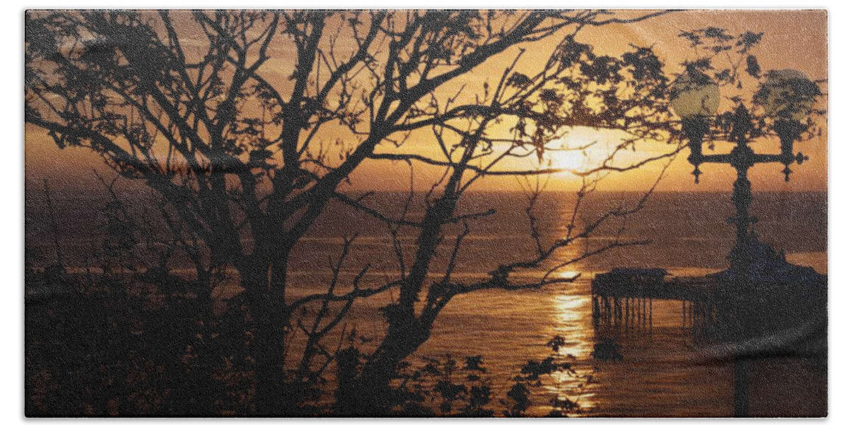 Sun Bath Towel featuring the photograph Sunrise over Llandudno pier by Christopher Rowlands
