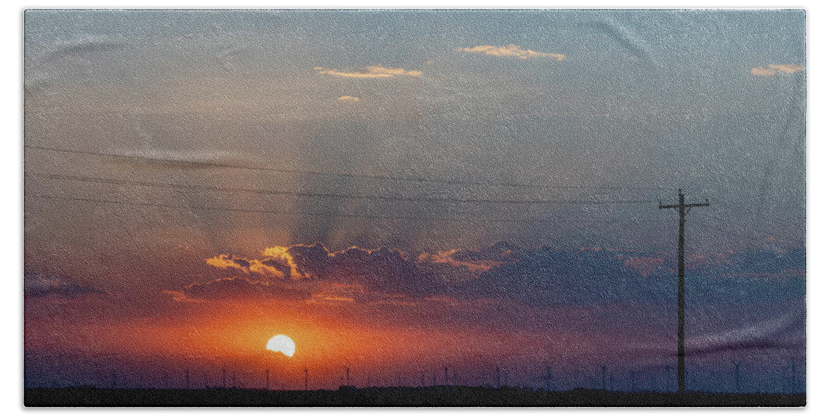 Sunset Hand Towel featuring the photograph Sunset over wind turbines by Debby Richards