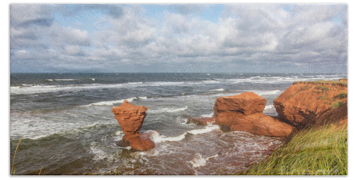 Red Bath Towel featuring the photograph Teacup rock of Prince Edward Island. by Jane Rix