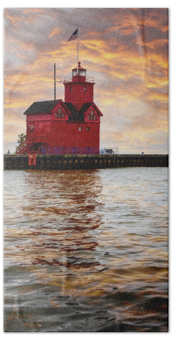 Lighthouse Bath Towel featuring the photograph The Holland Harbor Lighthouse by Debra and Dave Vanderlaan