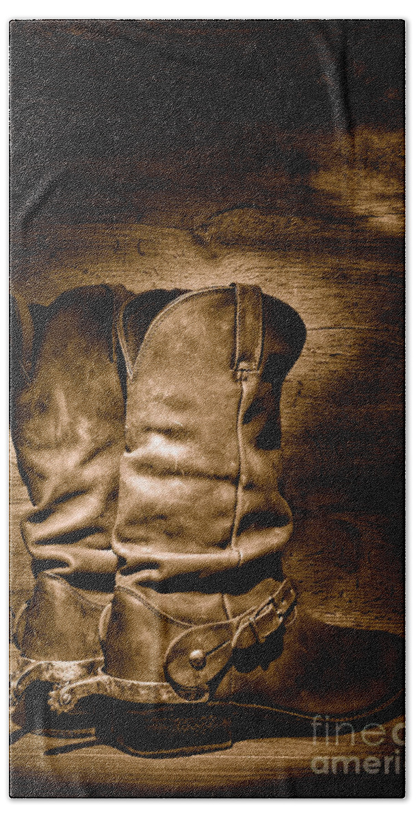 Cowboy Bath Towel featuring the photograph The Legendary Cowboy Boots - Sepia by Olivier Le Queinec