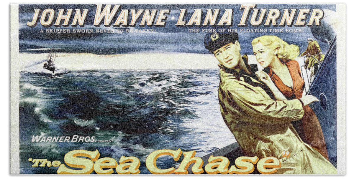 John Wayne Hand Towel featuring the mixed media ''The Sea Chase'' - 1955 by Movie World Posters