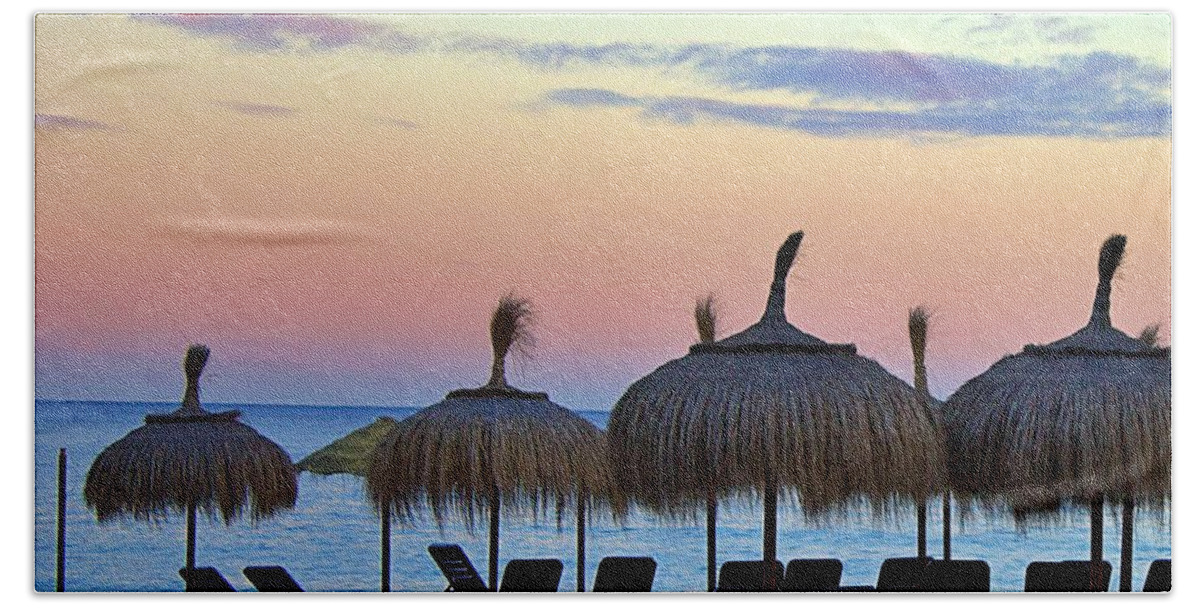 Andalusia Hand Towel featuring the photograph Tiki Umbrellas and Sunsets by Yvonne M Smith