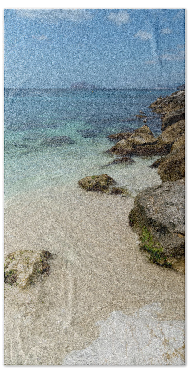 Mediterranean Bath Towel featuring the photograph Turquoise blue sea water and rocks in Calpe 1 by Adriana Mueller